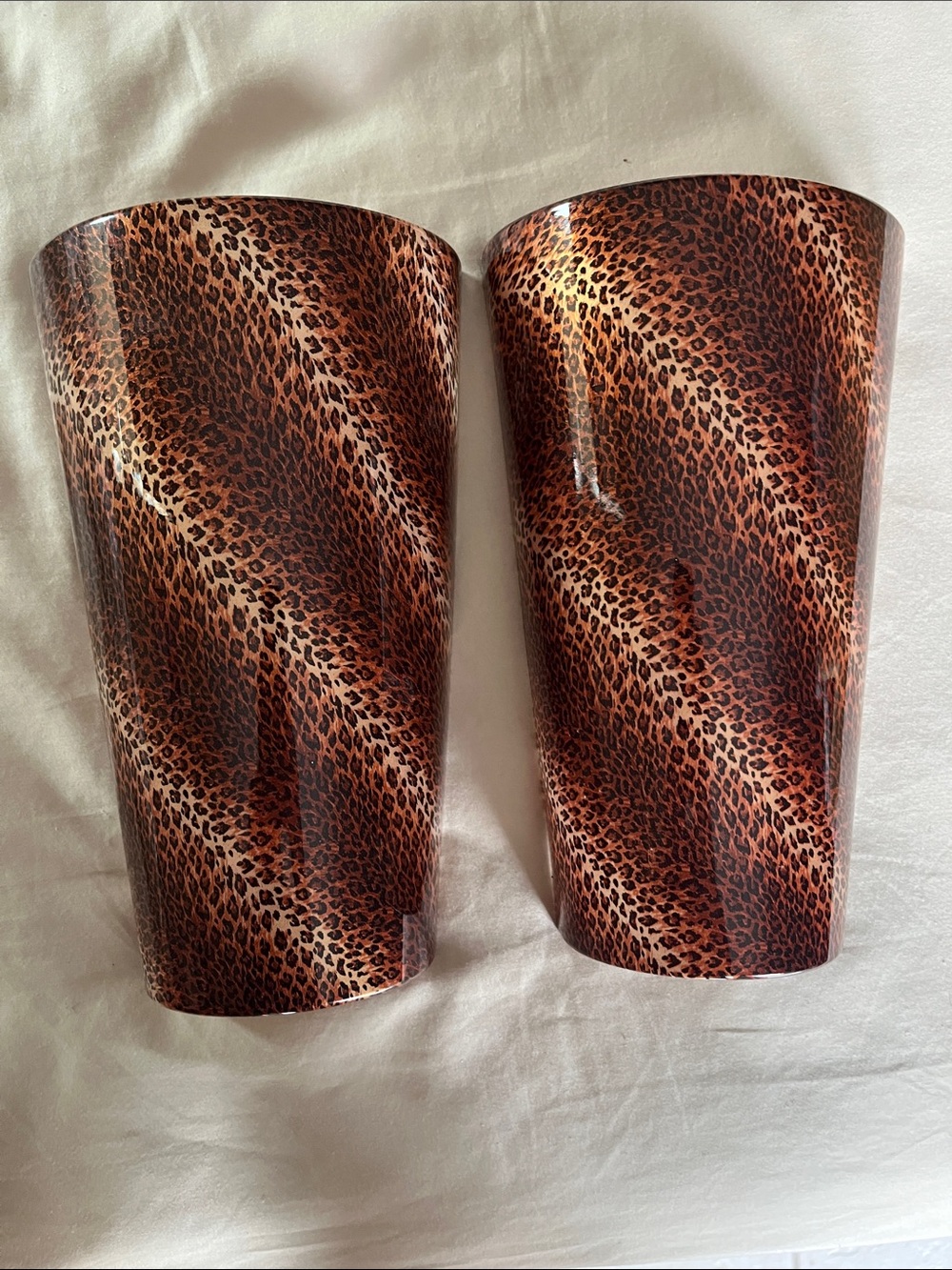 2 Battery powered  LED leopard print wall 
Light sconces 10” H AA batteries